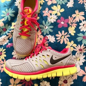 Nike Women's Gray and Pink Athletic Shoes with Yellow Sole